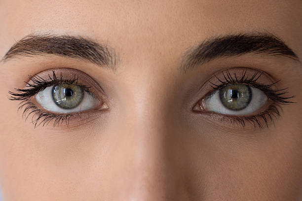 istock Green Eyes Close Up Beauty Portrait 2253253229