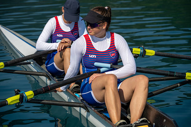 istock Two Female Rowers Training in Double Scull on Lake 2253254890