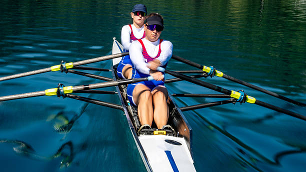 istock Blurred Motion Intense Rowing on Serene Lake 2253254913