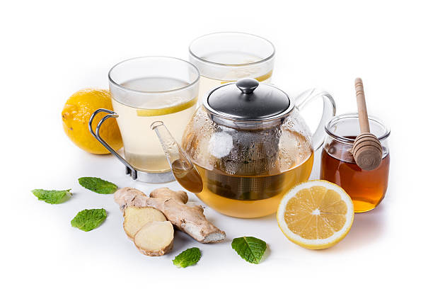 istock Ginger tea with honey and lemon in a cup 2253256224