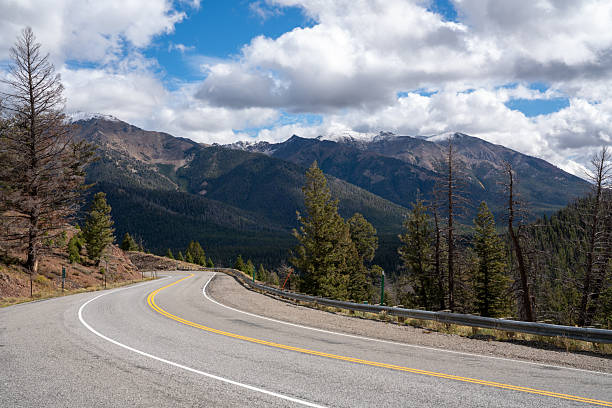 istock Winding mountain road double yellow line in Sawtooth mountains 2253259342