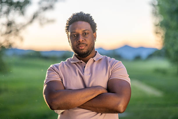 istock Young Hispanic Male Golfer Standing Confidently on Course 2253260784