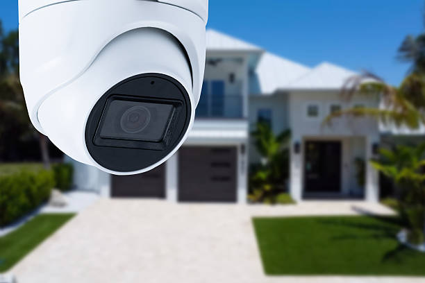istock Security camera and private house on the background. 2253261394