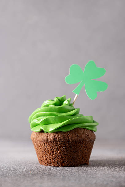 istock St. Patrick's Day tasty cupcake with green whipped cream. 2253263734