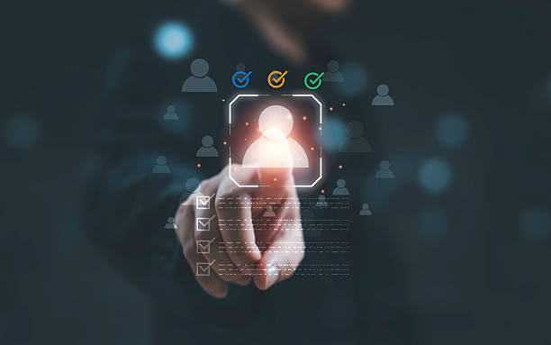 istock Businessman choosing highlighted candidate icon represents hiring decision talent evaluation human resources assessment workforce planning and professional recruitment process. 2253266621