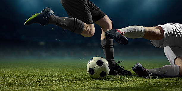 istock Football boots and ball interaction during close range duel 2253268310