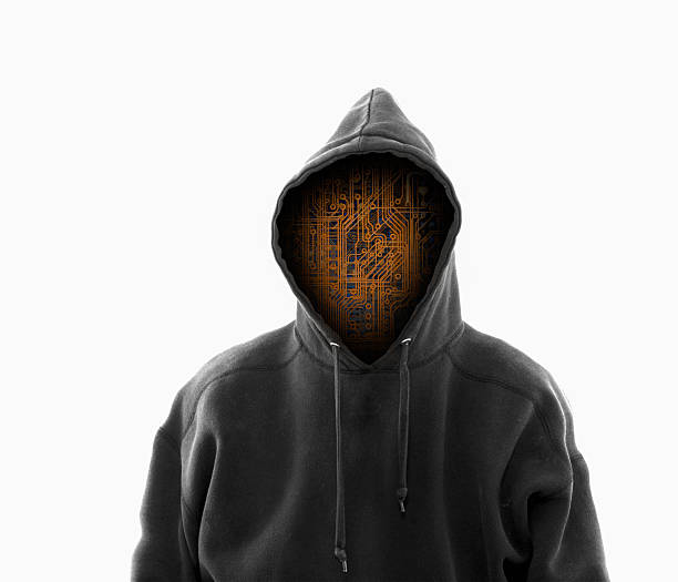 Conceptual image of cyber threats, computer mother board inside of hoodie on white background, ominous