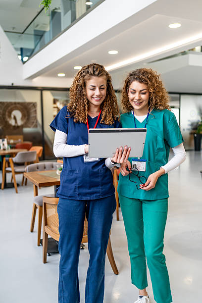 istock Healthcare professionals reviewing patient data on digital tablet 2253274647