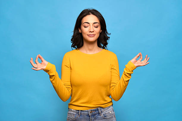 Woman finding inner peace and balance through mindful meditation