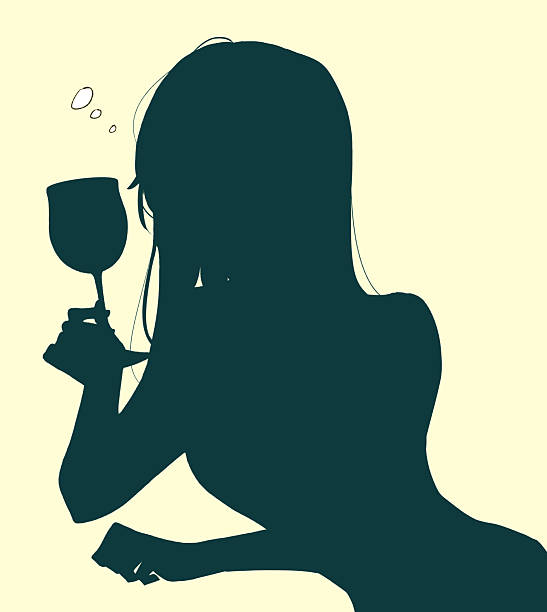 istock Woman holding a wine glass 2253277858