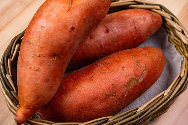 istock Fresh sweet potatoes in a woven basket ready for cooking or baking 2253279251