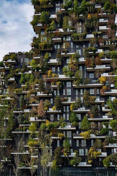 istock Modern architecture in Milan. Vertical forest building. Bosco Verticale skyscraper. Sustainable architecture. Vertical forest tower in Italy. Modern apartments by greenery. 2253291873
