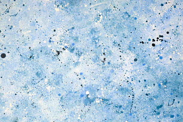 istock Abstract blue and white paint splatter design on textured background 2253293958