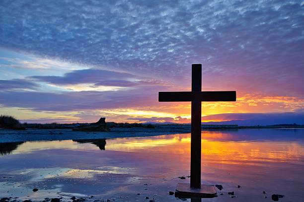 istock Dark Christian Cross Sunset 2253294164