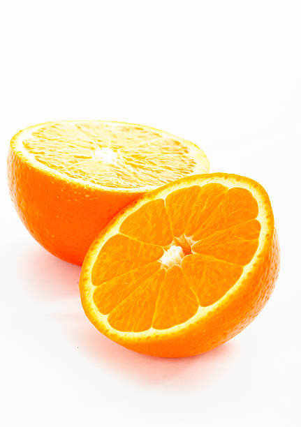 Freshly Cut Oranges Isolated On A White Background