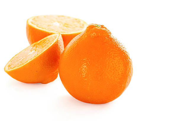 istock Freshly Cut Oranges Isolated On A White Background 2253294796