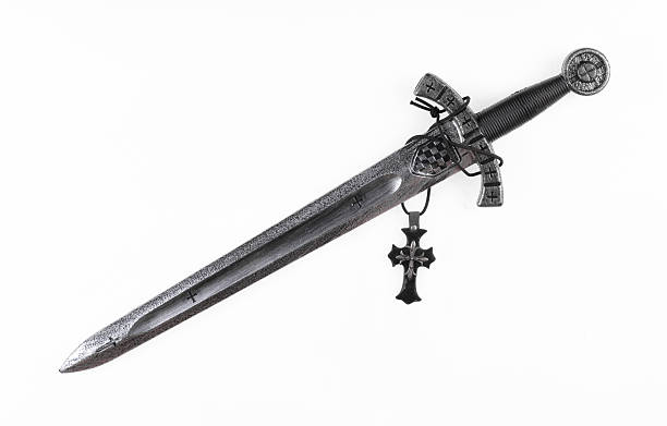 istock Sword and religion cross isolated on white background 2253297690
