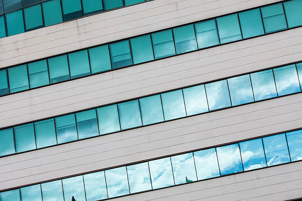 istock Reflections on office building in late afternoon light 2253300256