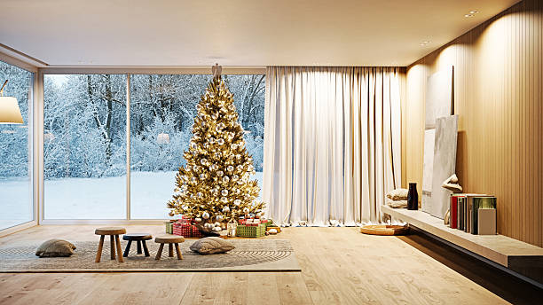 istock Modern interior with Christmas tree and snowy winter view. 3D rendering holiday home design 2253301190