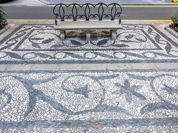 Stone bench in the old part of Granada, Andalusia, Spain