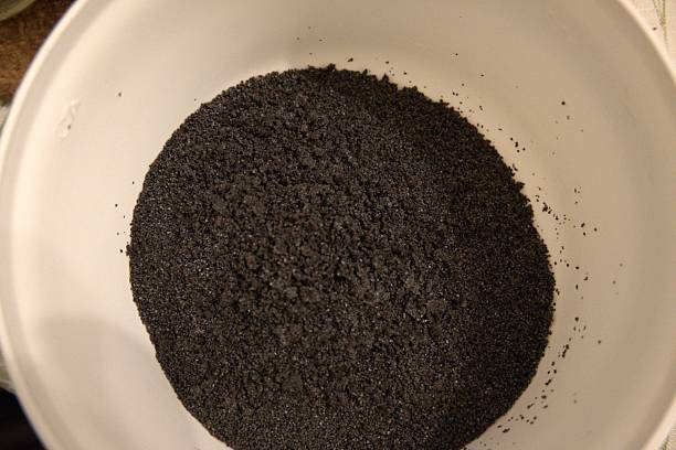 istock Ground poppy seed in white bowl 2253303137