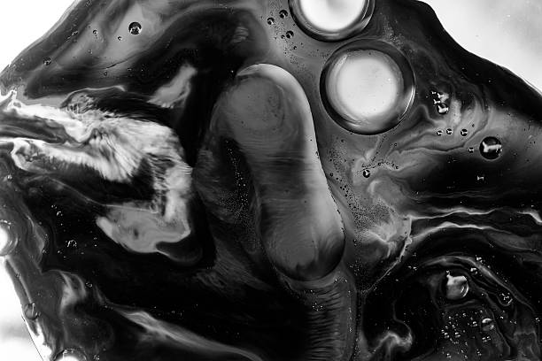 Monochrome abstract liquid macro with dramatic light and shadow, smooth gradients, and organic flow. Perfect for minimalist design, editorial backgrounds, conceptual art, and modern visual projects.