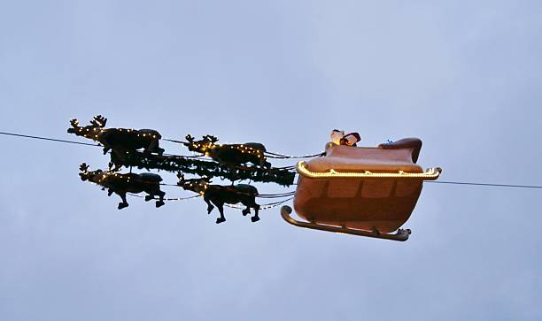 istock Christmas-Sled wit rendeers at the sky in Hamburg 2253306680
