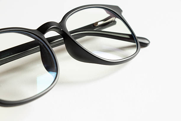istock Eye protection glasses for computer work, black frame with clear lenses on a white background, accessory for office, vision 2253307347