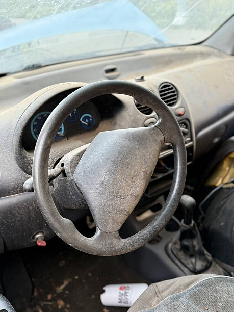 istock Dilapidated Vehicle Interior Featuring Worn Dashboard And Forsaken Papers, Elderly Automobile Cabin Showing Signs Of Decay With Abandoned Equipment And Misplaced Documents 2253308772