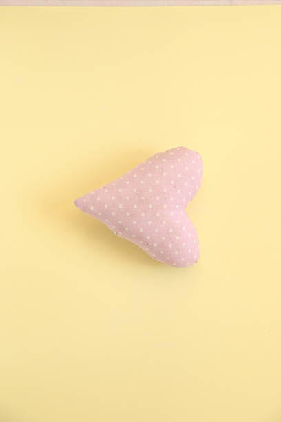 istock Heart on a yellow background. Holiday background. 2253309671