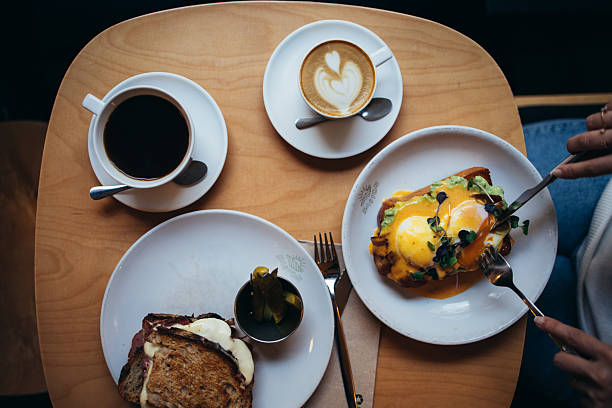 egg with toast and coffee on a blue wooden background