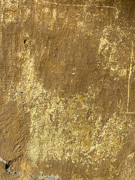 istock old yellowish brown wall with peeling texture 2253311097