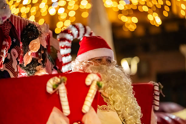 Christmas parade with Santa Claus on a float. Christmas 2025 in the main square of Tordesillas. Tordesillas, Valladolid, Castile and León, Spain, Europe - December 23, 2025.