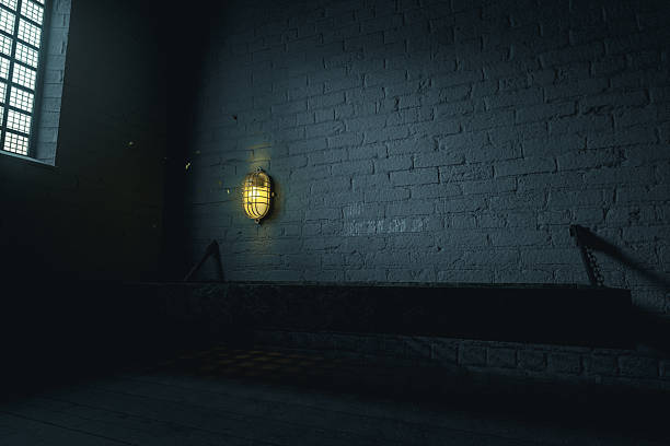 istock 3d rendering of grunge prison cell with bed and flying moths aro 2253312439