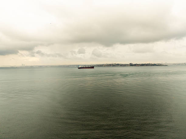 Istanbul, Turkey March 19, 2024 A tanker ship in the Bosporus seen from the Galataport district and the Camlica TV tower.