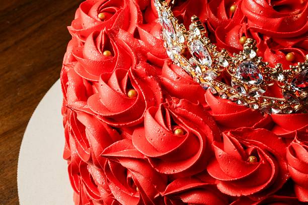 istock Elegant Red Rose Cake with Crown on Dark Background 2253315599