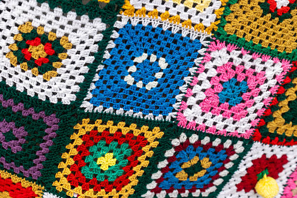 Granny square blanket showcasing a vibrant, handmade crochet patchwork design