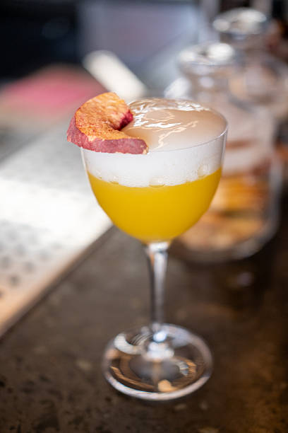 istock Alcoholic drink aperitif glass cocktail fruit foam 2253322650