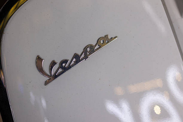 Vilnius, Lithuania - August 10, 2023: Porsche Targa badge on the B-pillar of the freshly restored 1971 Porsche 911 T Targa. Unbrushed steel.