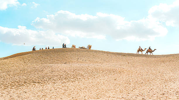Saqqara, Egypt - 04 Mar 2017: People close the ancient pyramid of Sakkara in the desert of Egypt