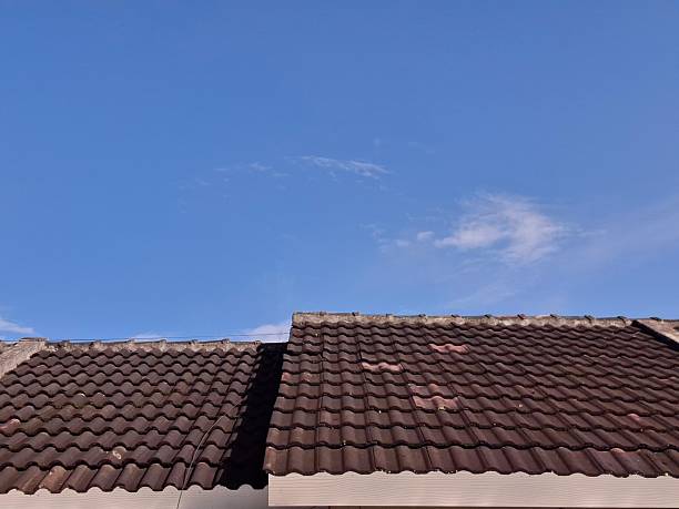 istock Modern Clay Tile Roof under a Clear Blue Sky 2253326658