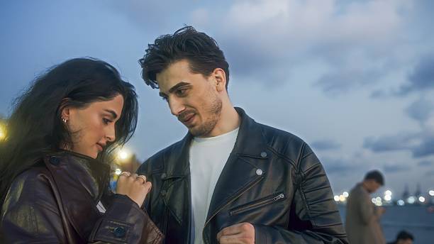 Couple Enjoying Romantic Evening by the Waterfront