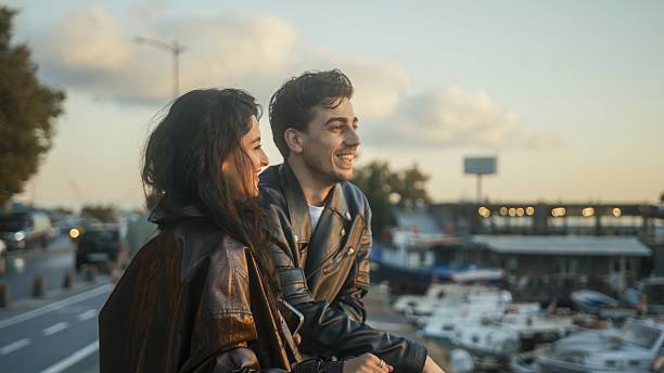 Couple Enjoying Sunset by the Marina
