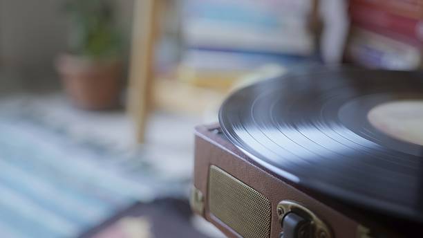 istock Vintage Record Player with Spinning Vinyl Disc 2253331634