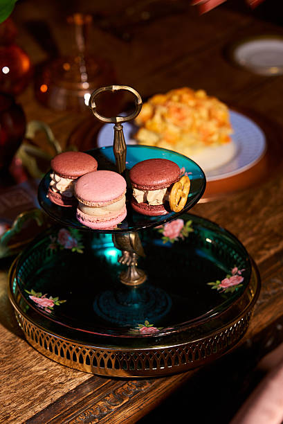 Macarons on a tiered stand with dessert on a table in Saint Petersburg, Saint Petersburg, Russia