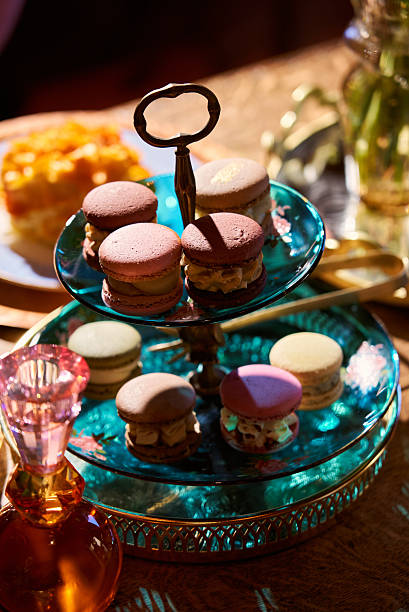A tiered stand holds various types of macarons in different colors in Saint Petersburg, Saint Petersburg, Russia