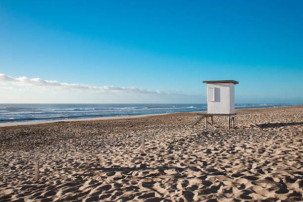 Lifeguard cabin on a beach landscape at sunrise. in Pinamar, Buenos Aires Province, Argentina