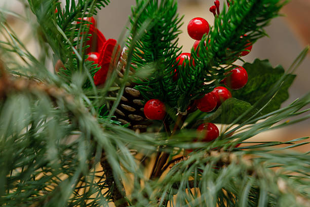 istock Berry decorations on a Christmas tree branch 2253334845