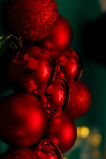 Christmas ornaments on red background, new year concept. Digitally generated image.