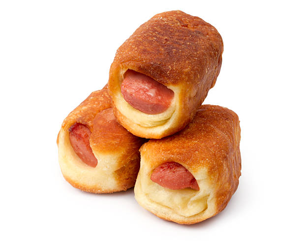 istock Three homemade sausages in dough on a white background 2253336665